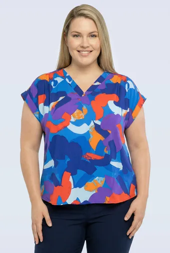 Bluza z barvitimi vzorci in V-izrezom